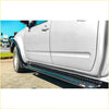 Black diamond plate steel rockarmor side step rail mounted on white nissan navara d40 ute for 4wd offroad use
