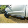 Black textured steel rockarmor side step rail mounted on silver toyota hilux n70 4wd ute for offroad use