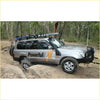 Silver toyota land cruiser 70 series 4wd with black rockarmor steel rockslider side steps for offroad use