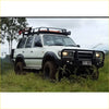 White toyota land cruiser fj80 with black rockarmor steel rockslider side steps perfect for offroad 4wd use