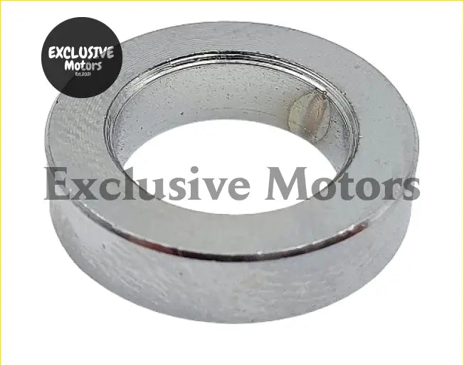 Chrome finished metal rocker cover spacer ring with smooth reflective surface and textured inner edge