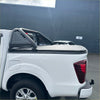White gwm cannon 2019 current pickup truck back with black perforated metal roll bar and matching tonneau cover
