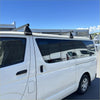 White van with black heavy duty roof rack bars on top showing the back side for toyota hiace 2005-2019 narrow