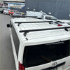 Black heavy duty roof rack 3 piece set mounted on the back of white 2019 toyota hiace zr zx van