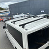 Black heavy duty roof rack 3 piece set mounted on the back of a white 2019 toyota hiace zr zx van