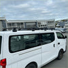 White nissan nv350 van with black heavy duty metal roof rack 4 piece set for 2012-current nv350 caravan back view