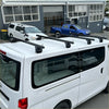 Black heavy duty roof rack 4 piece set mounted on white nissan nv350 caravan 2012-current van