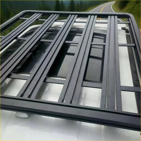 Black metal heavy duty roof rack with grid design mounted on white ford ranger 2022 plus back side view