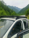 Black heavy duty roof rack with integrated led lights mounted on the back of a white 2022 ford ranger