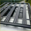Black metal heavy duty roof rack with grid design mounted on white ford ranger 2022+ seen from back side
