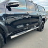 Shiny chrome stainless steel 4 inch oval tube running board side steps on black toyota hilux 2015-current