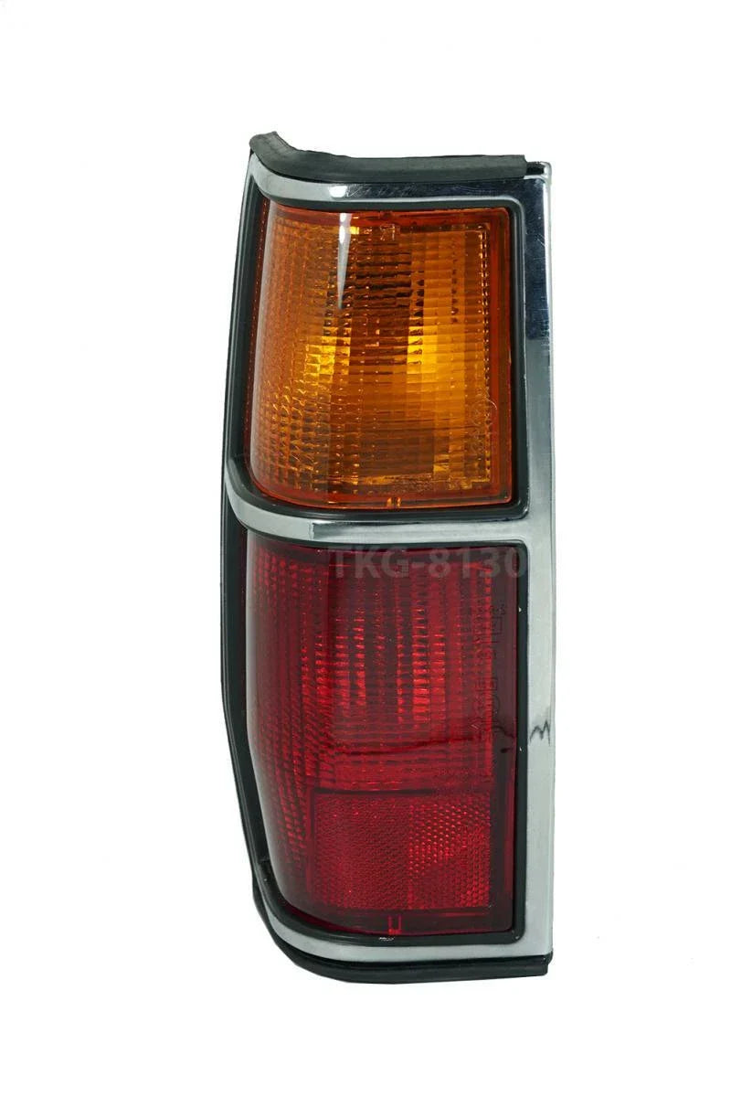 Nissan Datsun 720 4WD Left Tail Light Lamp Chrome Black Trim (1982-1984)