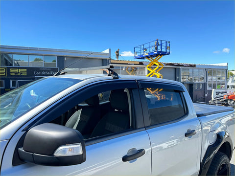 Silver ford ranger px1 px2 px3 with black side mirrors and door handles featuring s window monsoons weather shields