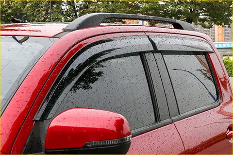 Black plastic window visors installed on red suv side for weather protection s slash window monsoons gwm cannon 2019 plus