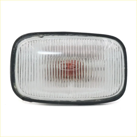 Black-framed clear ribbed plastic side indicator light with red lens for toyota hilux n140 n150 n160 rzn174 1997-2005