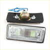 Rectangular clear lens side marker light with black rubber housing and metal mounts for Toyota Hilux 1972-1978