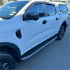 Silver metallic side step running board with textured ribbed surface and black rubber caps on white ford ranger 2022+ double cab