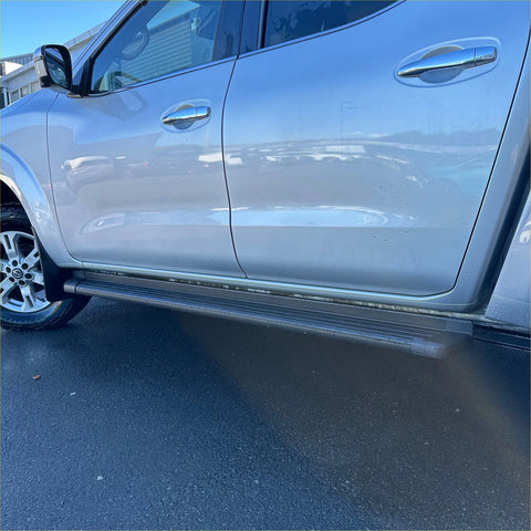 Silver metallic side step running board with textured ribbed surface for nissan navara 2015-current double cab