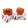 Orange rectangular toyota side turn signal lamps with black plastic housing and ribbed lens for hilux 1997-2006