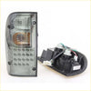 Black and clear smoked led tail light assembly with circular bulbs grid for Toyota Hilux MK4 MK5 rear side view