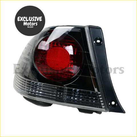 Smoked tail lights for Toyota Altezza RS200 black plastic assembly with clear lens and red illuminated circular bulb