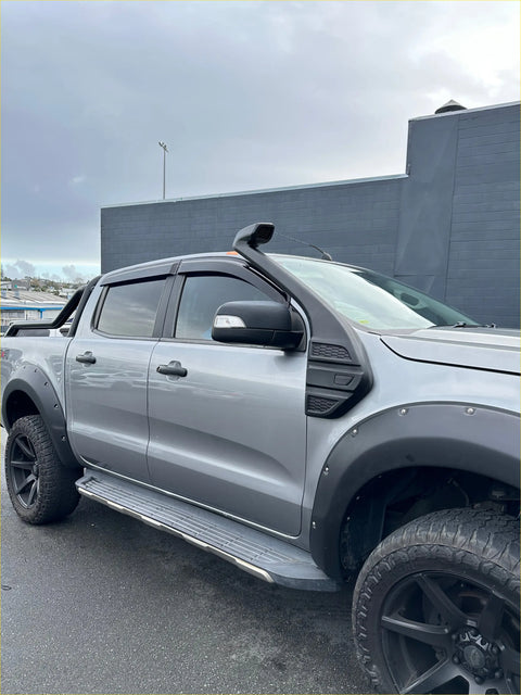 Silver ford ranger px2 px3 pickup with black fender flares side steps wheels featuring snorkel 2016-2021 model