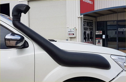 Black rubber snorkel tube mounted on the side of a white nissan np300 2015 to 2020 for off-road use
