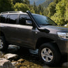 Black stainless steel snorkel mounted on front of dark gray toyota land cruiser 200 series 2017-2022