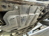 Dusty gray metal engine oil pan protector with riveted mounts and ridges for nissan navara np300 2016 model