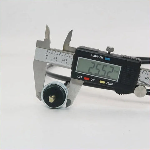 Black digital caliper measuring silver and black cylindrical speedo cable for nissan datsun bluebird sss 510 1600 1968-1973