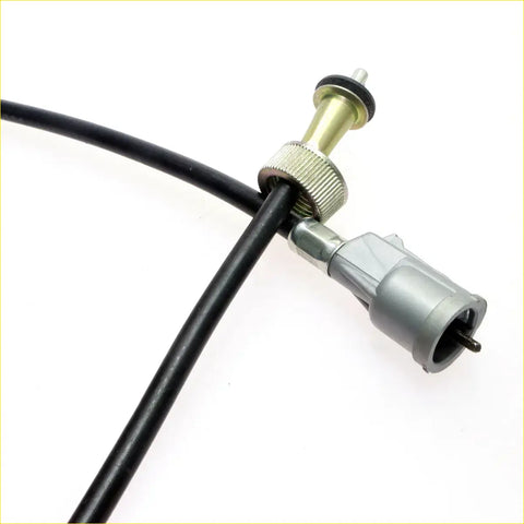 Black rubber-coated speedometer cable for Toyota Hilux 1979-1983 with metallic silver connector and brass housing
