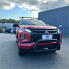 Red Mitsubishi Triton pickup with black stainless steel medium size nudge bar 2019-2023 front guard and roof rack