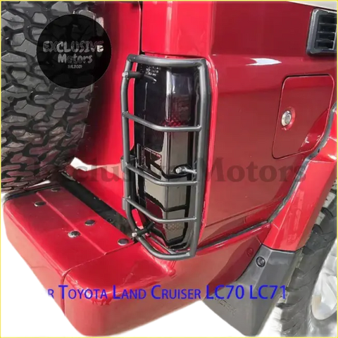 Black metal cage style stainless steel tail light guard mounted on red toyota land cruiser lc70