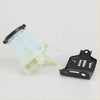 Translucent light blue plastic steering fluid reservoir with black cap white fittings and black metal bracket for toyota hilux diesel