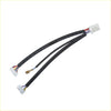 Black insulated electrical cable with multiple colored wires and white connectors for steering wheel cruise volume control switch on toyota land cruiser prado back side