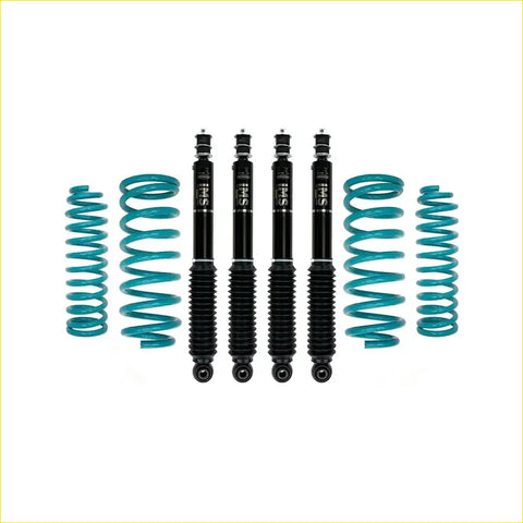 Set of four black sfi shock absorbers with teal coil springs for suzuki jimny gj 3 door 2018 on lift kit
