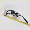 Black plastic steering wheel control module with multicolored wiring and beige connector for toyota hilux ln60 back side