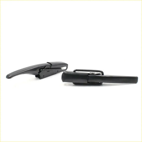 Black plastic tail gate lock handle end caps with integrated grips and mounting hardware for toyota hilux ln rn series