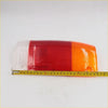 Tail light lens set for mazda b2000 b2200 b2600 featuring red and orange plastic with clear lens on left side