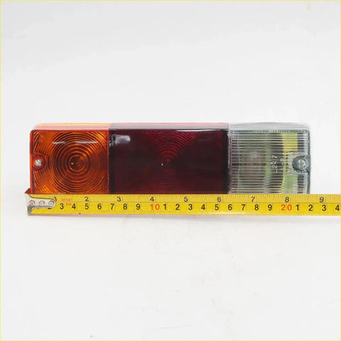Tail light x2 for nissan datsun 520 521 j13 1968-1973 orange red clear plastic assembly with yellow measuring tape underneath