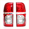 Backside of red and clear led tail lights with modern angular design for toyota hilux sr5 2004-2015 x2
