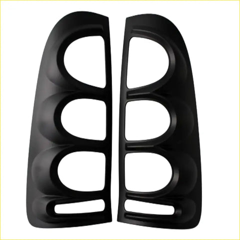 Black plastic side mirror covers for toyota hilux vigo 2005-2012 with glossy finish and three oval cutouts each