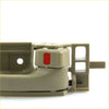 Beige plastic tan door handle bezel with red accent for Toyota Hilux SR5 2004-2013 pull knob close-up
