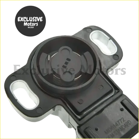Black plastic throttle position sensor for mitsubishi with white rectangular connector and molded mounting tabs