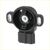 Black plastic throttle position sensor with central metal part and two tabs for Toyota Land Cruiser Tundra Sequoia