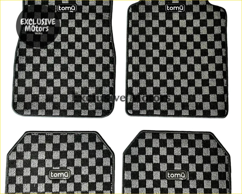 Black and gray checkered Tomu grey checker floor mats with textured weave and Tomu brand logo on each mat