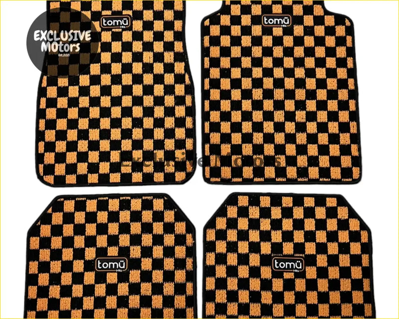 Black and orange checkered tomü floor mats with woven texture designed for car interiors