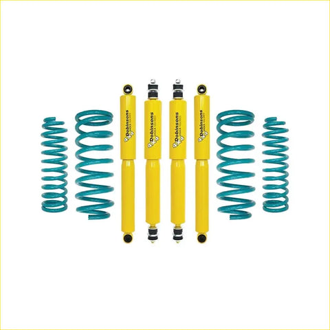 Set of four bright yellow dobinsons twin shock absorbers with teal coil springs for toyota landcruiser 105 series