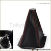 Universal black carbon fiber grain shifter knob boot cover with black leather, red stitching, and silver metallic top