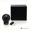 Black spherical universal real carbon fiber aluminum gear knob with matte finish and erman sport branding at the base